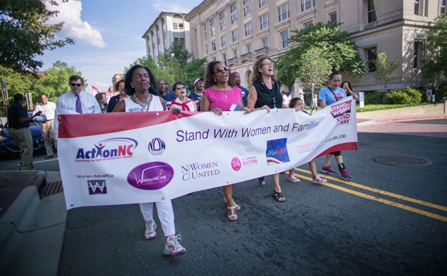 Activists celebrate Women's Equality Day at downtown rally