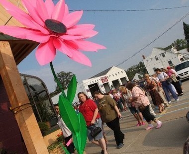 Free roses up for grabs on Good Neighbor Day at Burton florist, with a twist