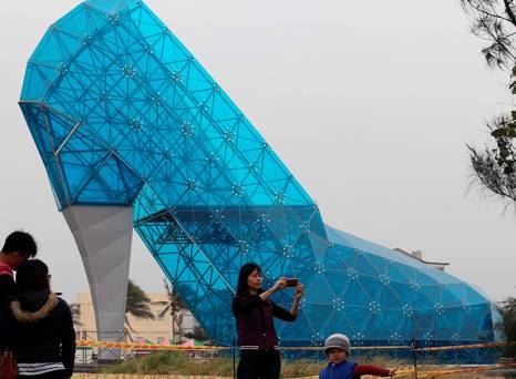 Poll: Taiwan's high-heel shoe shaped church - would it attract you to attend?