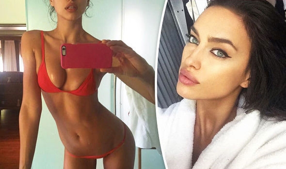 Red hot! Irina Shayk sizzles in sexy scarlet bikini a day after celebrating ...