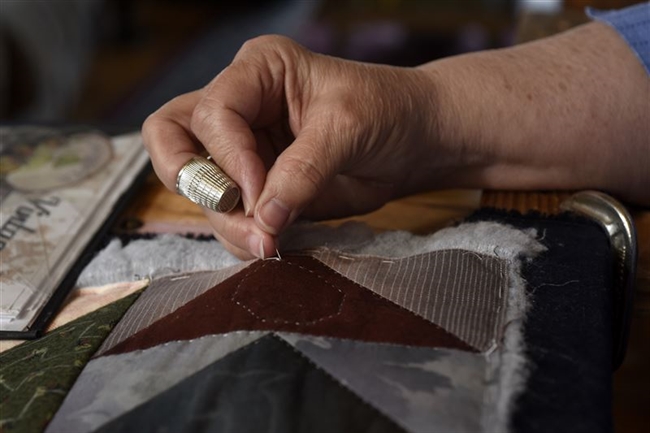 Marie Troyer's needlecraft hobby replaced by passion for quilting