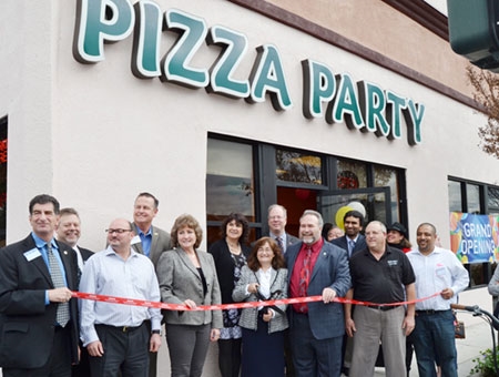 Pizza Party Celebrates With Ribbon Cutting at New Location