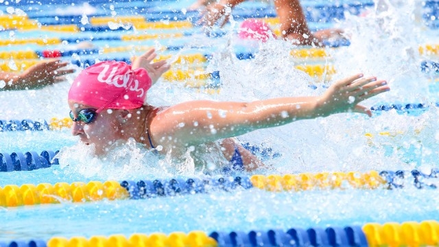 UCLA swimming sports pink caps to spread breast cancer awareness